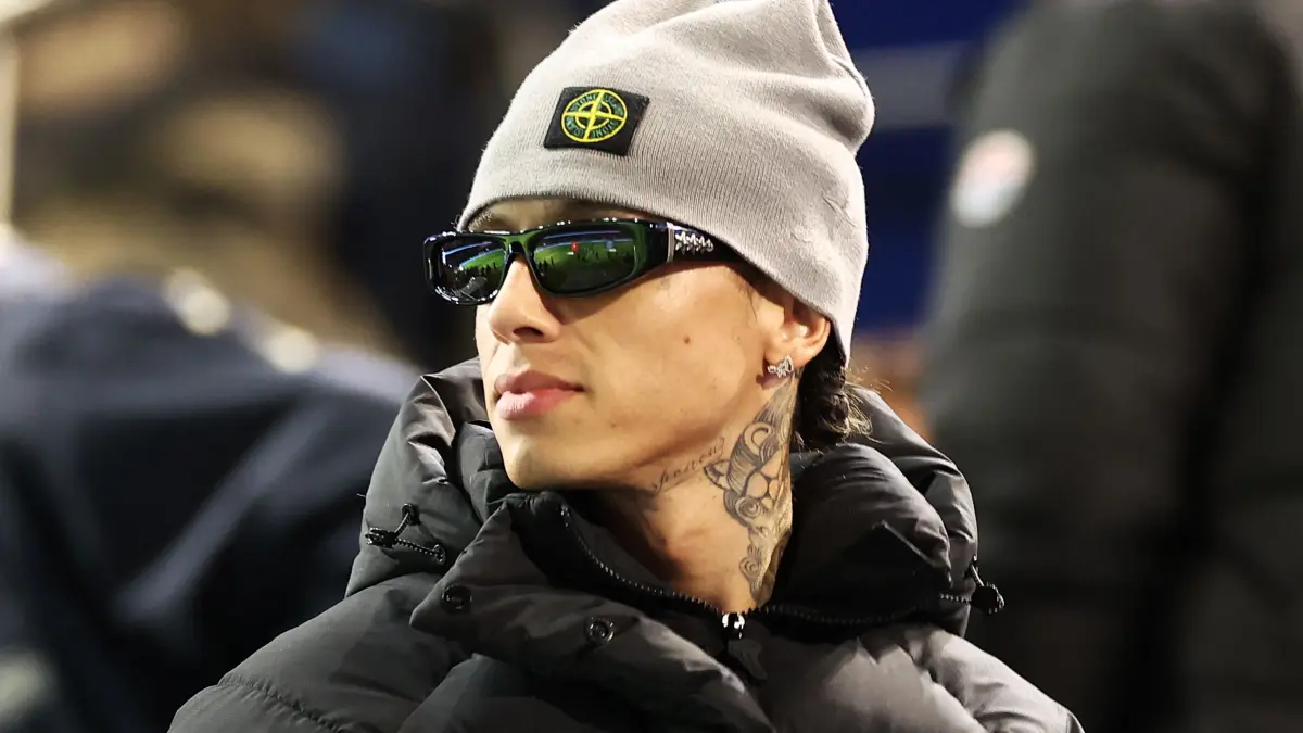 British rapper and songwriter Central Cee looks on prior to the start of the French L1 football match between Paris Saint-Germain (PSG) and Stade Rennais FC at The Parc des Princes Stadium in Paris on September 27, 2024. (Photo by FRANCK FIFE / AFP)