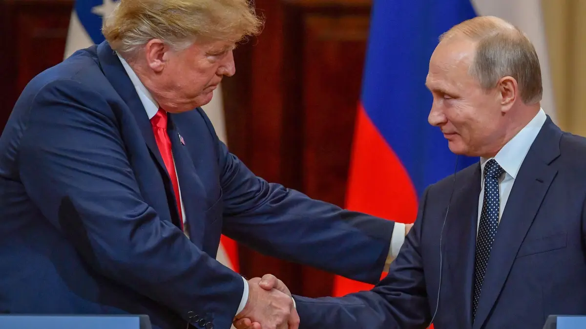 (FILES) US President Donald Trump (L) and Russia's President Vladimir Putin shake hands before attending a joint press conference after a meeting at the Presidential Palace in Helsinki, on July 16, 2018. US President-elect Donald Trump suggested November 7, 2024 that he would likely speak with Russia's President Vladimir Putin, NBC News reported, after the Republican was swept to victory in the US presidential election. (Photo by Yuri KADOBNOV / AFP)