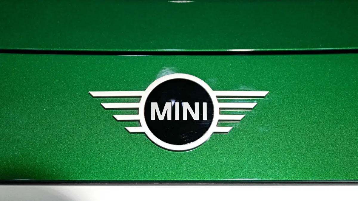 The logo of British automaker Mini is pictured at the Bharat Mobility Global Expo 2025, in New Delhi on January 21, 2025. (Photo by Money SHARMA / AFP)