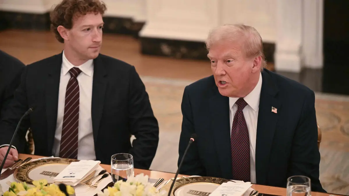 President Trump hosts a dinner in the State Dining Room for tech and business leaders: US President Donald Trump speaks with Meta CEO Mark Zuckerberg as he hosts a dinner for tech leaders in the State Dining Room at the White House in Washington, DC, on September 4, 2025. (Photo by SAUL LOEB / AFP)