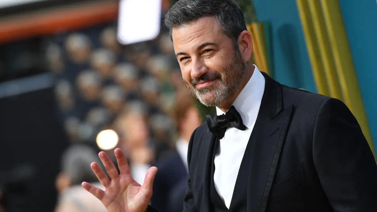 (FILES) Talk show host Jimmy Kimmel arrives for the 74th Emmy Awards at the Microsoft Theater in Los Angeles, California, on September 12, 2022. Jimmy Kimmel's late-night show was pulled from the air on September 17, 2025, hours after the US government threatened to cancel broadcasting licenses because of comments the host made about the killing of conservative influencer Charlie Kirk. The stunning move by network ABC to remove one of America's most influential late-night shows was blasted by critics as government censorship but celebrated by Donald Trump, who has long chafed at the comedians who mock him. (Photo by Chris Delmas / AFP)
