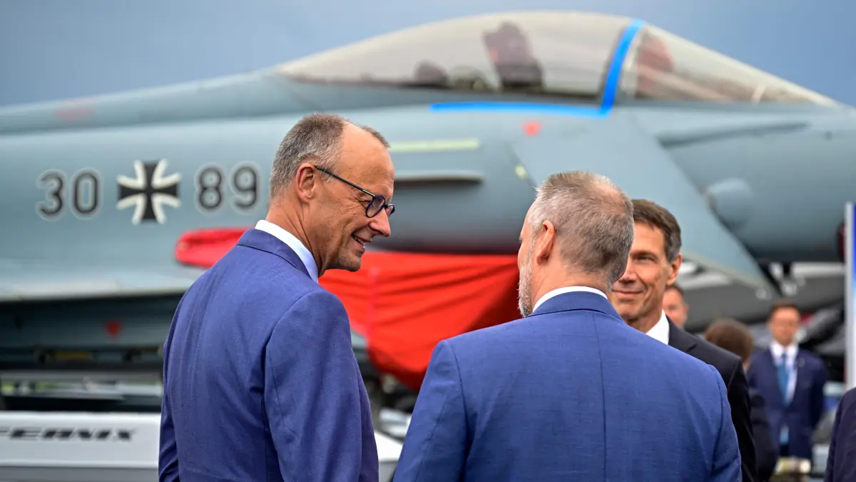 German Chancellor Friedrich Merz attends the opening day of International Aerospace Exhibition (ILA) in Schoenefeld, near Berlin on June 10, 2026. (Photo by Tobias SCHWARZ / AFP)