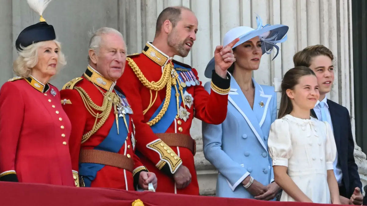 Britain's Queen Camilla, Britain's King Charles III, Britain's Prince William, Prince of Wales, Britain's Catherine, Princess of Wales, Britain's Princess Charlotte of Wales, Britain's Prince George of Wales, Britain's Prince Louis of Wales watch the flypast on the balcony of Buckingham Palace after attending the King's Birthday Parade "Trooping the Colour" in London on June 13, 2026. (Photo by JUSTIN TALLIS / AFP)