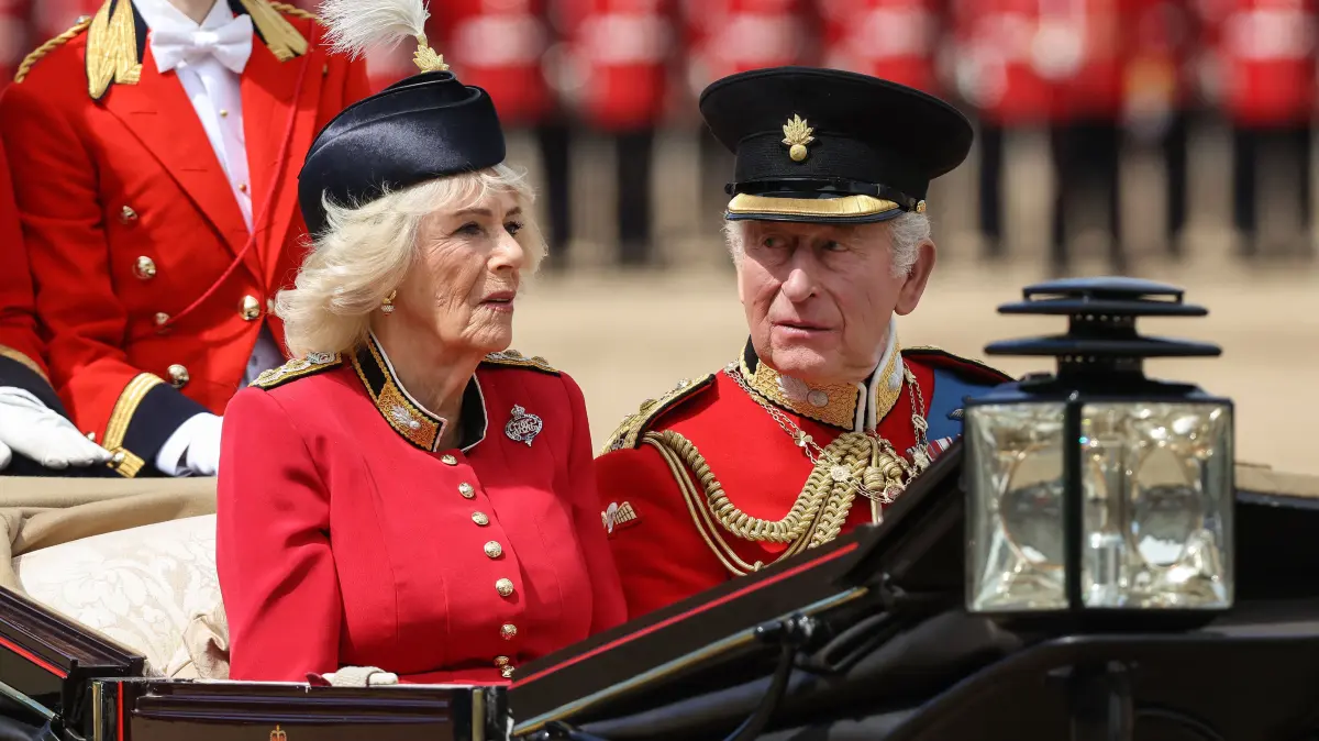 Britain's King Charles III and Britain's Queen Camilla arrive to attend the King's Birthday Parade "Trooping the Colour" in London on June 13, 2026. (Photo by Toby Shepheard / AFP)