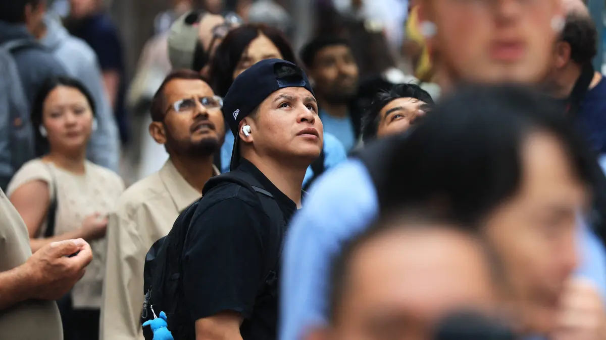 Midtown Manhattan Building Evacuated After Supporting Columns Buckle Inside: NEW YORK, NEW YORK - JULY 07: People look up at the former Pfizer headquarters building on July 07, 2026, in New York City. Construction workers at the former pharmaceutical company building, now a high-profile housing project, were evacuated after a determination that it was at risk of collapse. According to city Buildings Department records, a safety manager reported that a steel beam on the 21st floor was compromised . The fire department said that two interior supporting columns were buckling and that several upper floors were sagging. The project, which architects described as the largest of its kind in city history, was scheduled to be completed in 2027. A number of streets were closed to auto and pedestrian traffic as evaluation of the building continues. Spencer Platt/Getty Images/AFP (Photo by SPENCER PLATT / GETTY IMAGES NORTH AMERICA / Getty Images via AFP)
