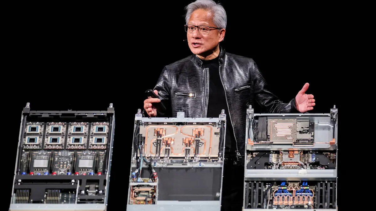 FILES-TAIWAN-SEMICONDUCTORS-CRIME: (FILES) Nvidia CEO Jensen Huang delivers his keynote speech at Computex 2026 in Taipei on June 1, 2026. Prosecutors in Taiwan have detained an Nvidia employee as part of an investigation into the smuggling of the US tech giant's AI chips to China, a source familiar with the case told AFP on July 28, 2026. (Photo by I-Hwa Cheng / AFP)