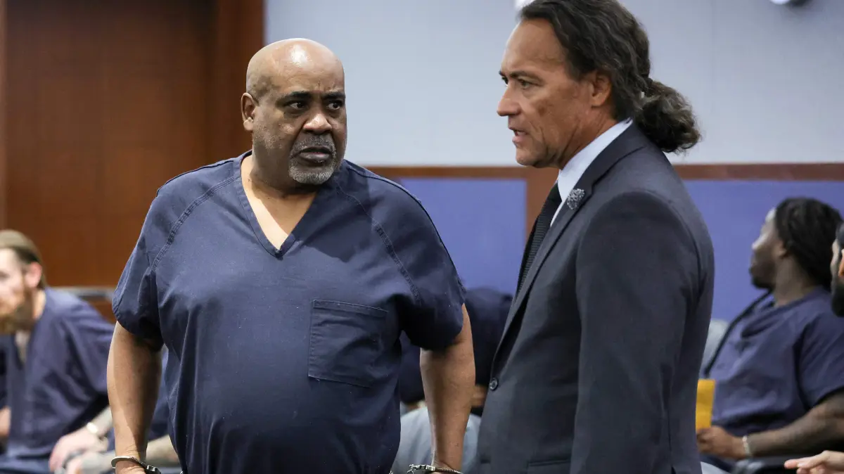 Pretrial Check-in Held For Tupac Shakur Murder Suspect Duane Davis: LAS VEGAS, NEVADA - AUGUST 04: Duane Davis (L) talks with his attorney Michael Sanft in Clark County District Court during a calendar call and motion hearing for Davis' upcoming trial at the Regional Justice Center on August 04, 2026 in Las Vegas, Nevada. Davis was indicted on murder charges for his involvement in the killing of rapper Tupac Shakur in 1996. His trial is scheduled to start on August 10, 2026. Ethan Miller/Getty Images/AFP (Photo by Ethan Miller / GETTY IMAGES NORTH AMERICA / Getty Images via AFP)
