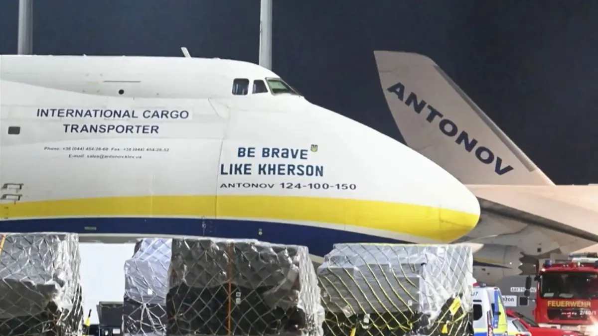 GERMANY-AIRPORT-AVIATION-POLICE: A video grab taken from a video footage by News5 from August 5, 2026 the nose of an Ukrainian "Antonov" plane at German airport Leipzig-Halle in Schkeuditz, eastern Germany, after a drone was spotted nearby. German police deployed a bomb disposal robot at the airport after a drone was found near a Ukrainian-flagged cargo plane overnight, also forcing the diversion of numerous flights. Another aircraft, which had to abort its scheduled landing at Leipzig-Halle airport, then collided mid-air with an unknown object several kilometres away but later landed safely, the government said. The airport in eastern Germany plays a key role in the transport of military goods, including by the German military and NATO allies, and also serves as a base for Ukraine's Antonov Airlines. (Photo by NEWS5 / AFP)