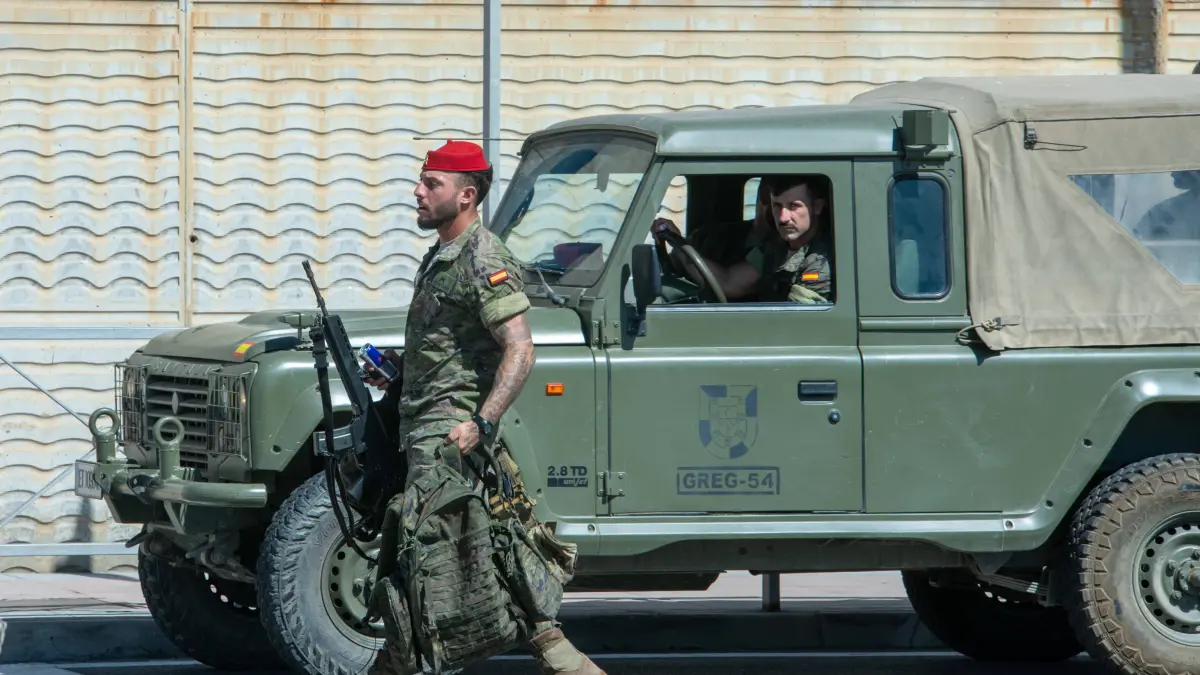 August 2, 2026, Ceuta, Madrid, Spain: Military personnel and police officers escort a group of Moroccan migrants toward the border with Morocco in the Spanish enclave of Ceuta, Spain, August 2, 2026. Armed forces and national police have begun rounding up and escorting the remaining migrants who entered irregularly during a massive migration crisis in recent days, allowing the city s streets and shops to return to normalcy. Ceuta Spain PUBLICATIONxINxGERxSUIxAUTxONLY - ZUMAd308 20260802_zsp_d308_076 Copyright: xJuanxCarlosxLucasx