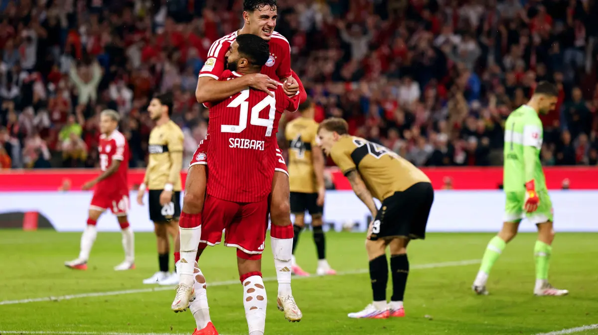 FBL-GER-BUNDESLIGA-BAYERN MUNICH-STUTTGART: Bayern Munich's German midfielder #45 Aleksandar Pavlovic celebrates scoring his team's fourth goal with Bayern Munich's Moroccan midfielder #34 Ismael Saibari during the German first division Bundesliga football match between FC Bayern Munich and VfB Stuttgart in Munich, southern Germany, on August 28, 2026. (Photo by Alexandra BEIER / AFP) / DFL REGULATIONS PROHIBIT ANY USE OF PHOTOGRAPHS AS IMAGE SEQUENCES AND/OR QUASI-VIDEO