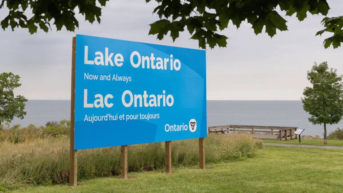 CANADA-ONTARIO-HAMILTON-LAKE ONTARIO-NAME: 260830 -- HAMILTON, Aug. 30, 2026 -- An English-French bilingual sign reading Lake Ontario Now and Always is pictured at a lakeside conservation area in Hamilton, Ontario, Canada, on Aug. 30, 2026. Canadian Prime Minister Mark Carney said Thursday that the name Lake Ontario carries a long history and that Canadians will always use this name regardless of external changes. The Canadian prime minister made the remarks after U.S. President Donald Trump signed an executive order earlier on Thursday, directing the Department of the Interior to rename the lake Lake America, as trade tensions between the United States and Canada have been escalating. Photo by /Xinhua CANADA-ONTARIO-HAMILTON-LAKE ONTARIO-NAME ZouxZheng PUBLICATIONxNOTxINxCHN