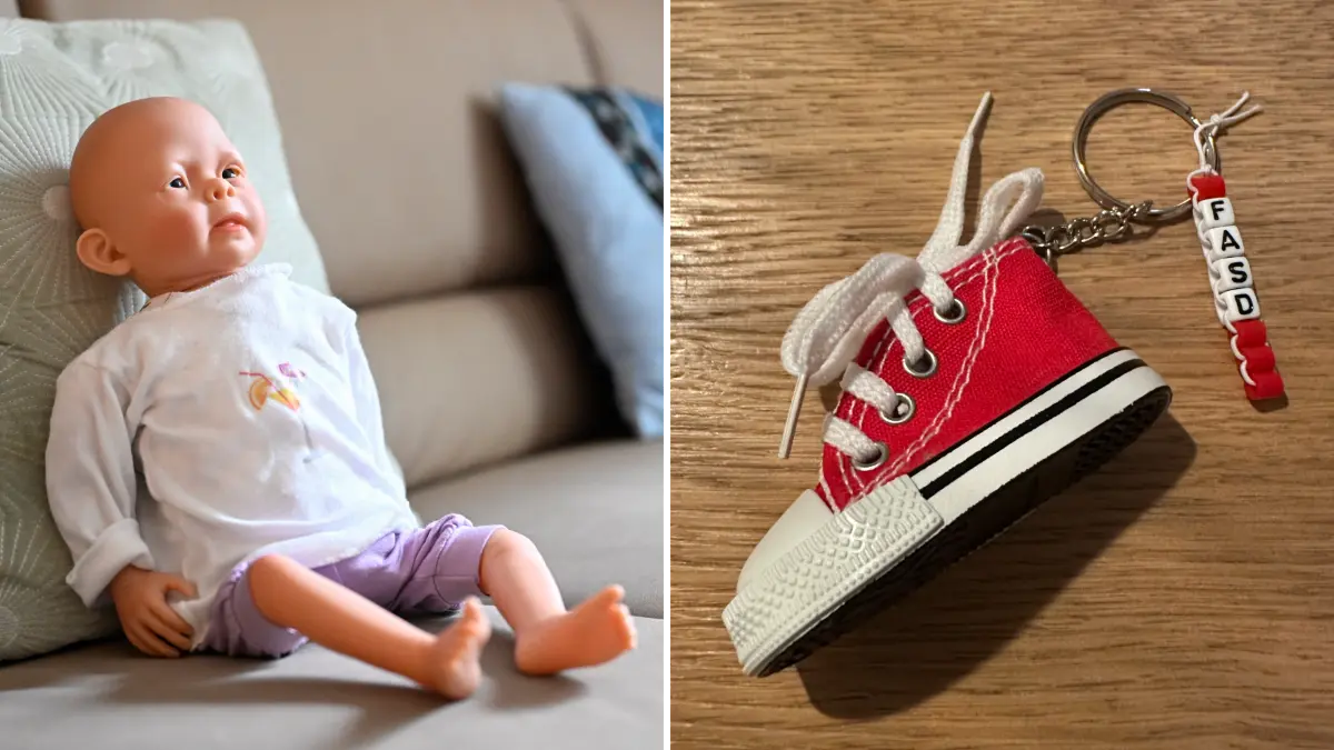 Kinder, die mit einer fetalen Alkoholspektrumsstörung geboren wurden, können auffällige Gesichtszüge wie diese Puppe haben, das muss aber nicht der Fall sein. Rote Schuhe werden am Mittwoch auf dem Marktplatz verteilt.