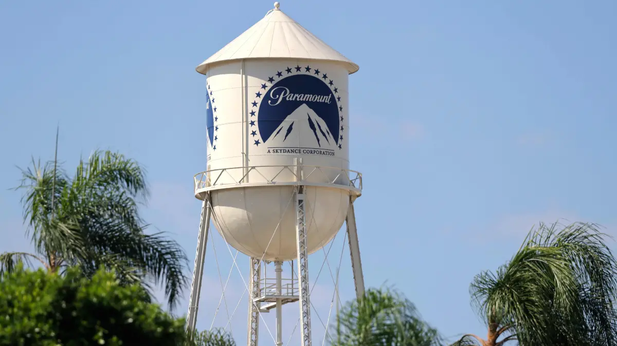 Paramount Settles Multi State Lawsuit, Clearing Way For Merger With Warner Bros: LOS ANGELES, CALIFORNIA - SEPTEMBER 21: The Paramount logo is displayed on the water tower at Paramount Studios on September 21, 2026 in Los Angeles, California. A state-led antitrust lawsuit challenging Paramount Skydance’s $110 billion merger with Warner Bros. Discovery was announced as settled today, clearing a major legal hurdle for the deal. Mario Tama/Getty Images/AFP (Photo by MARIO TAMA / GETTY IMAGES NORTH AMERICA / Getty Images via AFP)