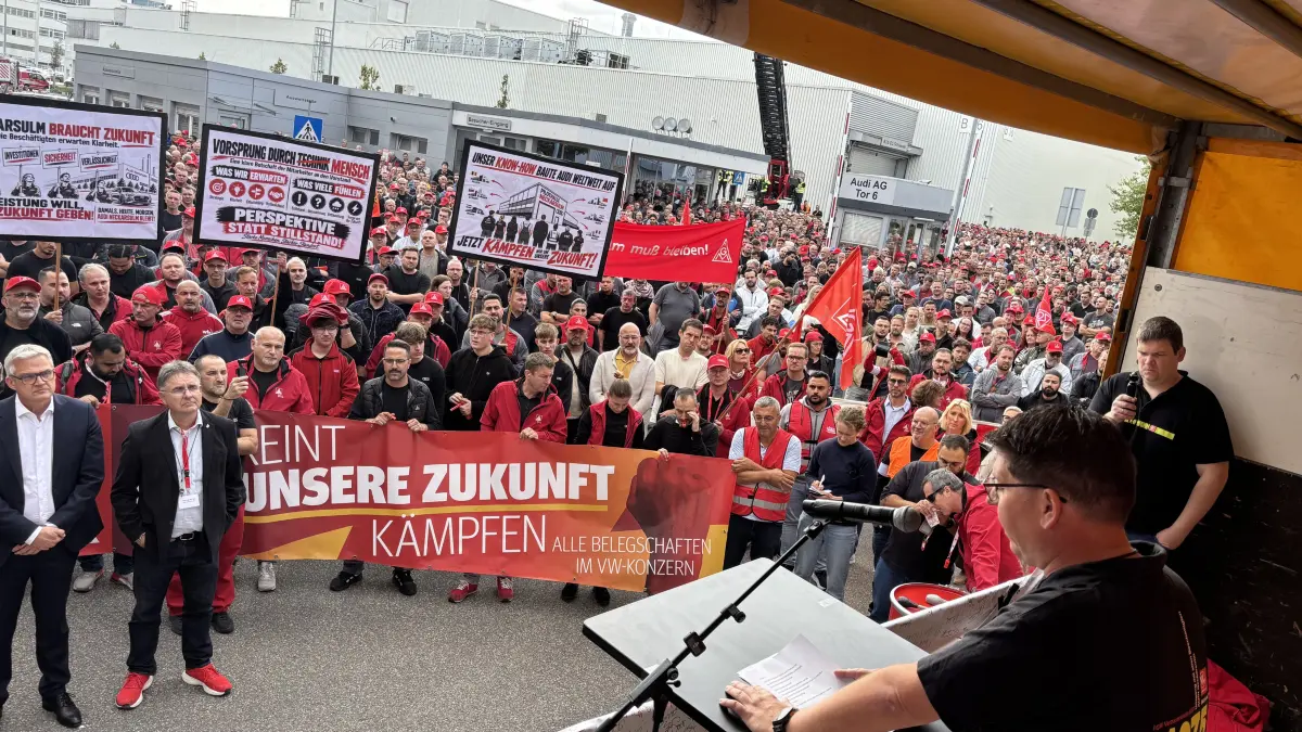 Der Betriebsratschef von Audi Neckarsulm, Alexander Reinhart, erinnert an den geschichtsträchtigen Marsch auf Heilbronn.