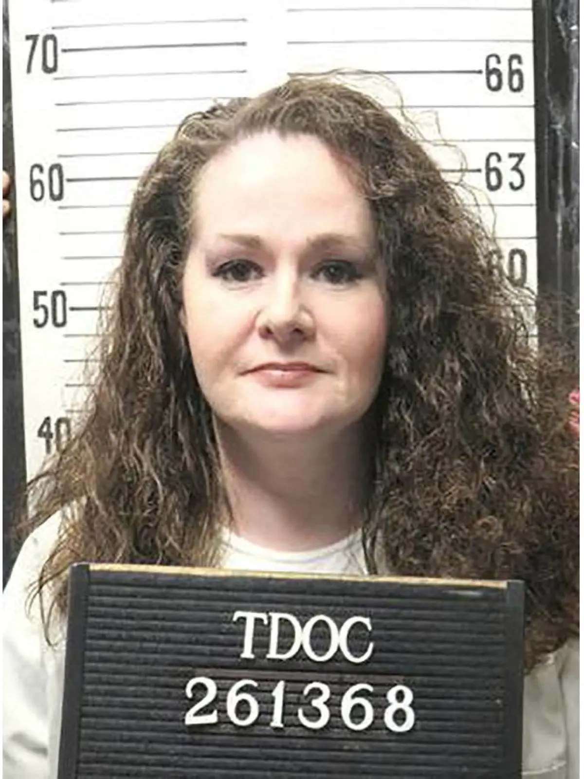 FILES-US-JUSTICE-EXECUTION: (FILES) This handout picture dated January 12, 2023 provided by the Tennessee Department of Correction shows convicted US murderer Christa Pike. Pike, the convicted murderer who survived a botched execution attempt in the US state of Tennessee on September 30, 2026, has been discharged from hospital and returned to prison, her lawyers said on October 10. Pike, 50, was administered two lethal doses of the drug pentobarbital on September 30 that failed to kill her. (Photo by Handout / Tennessee Department of Correction / AFP) / RESTRICTED TO EDITORIAL USE - MANDATORY CREDIT "AFP PHOTO / Tennessee Department of Correction" - NO MARKETING NO ADVERTISING CAMPAIGNS - DISTRIBUTED AS A SERVICE TO CLIENTS
