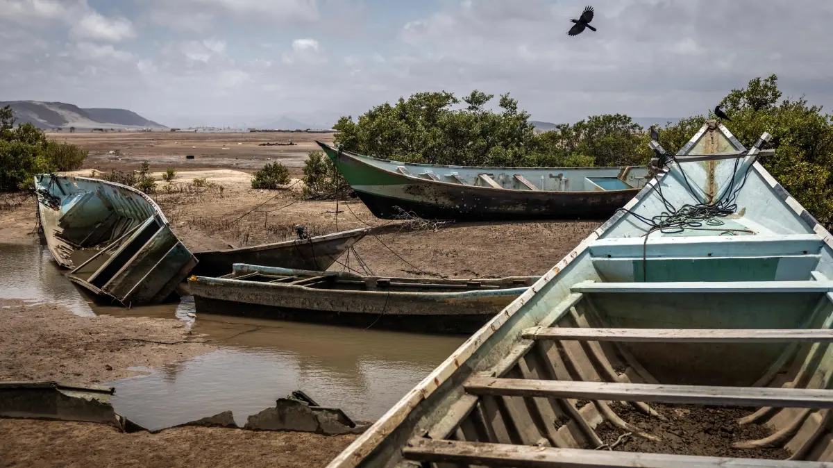 FILES-DJIBOUTI-MIGRATION: (FILES) Boats seized from smugglers attempting to transport migrants to Yemen are stored at a Coast Guard post in Khor Angar, on April 12, 2026. At least 109 migrants were killed, including 15 children, and some 116 were missing after a boat sank off the shores of Djibouti overnight on October 8-9, a UN agency said Sunday.
Survivors said the vessel -- which was carrying 350 people from Djibouti to Yemen -- capsized north of the Djibouti town of Obock, according to a statement from the International Organization for Migration (IOM), whose teams are on the ground alongside local authorities to provide emergency aid. (Photo by Luis TATO / AFP)