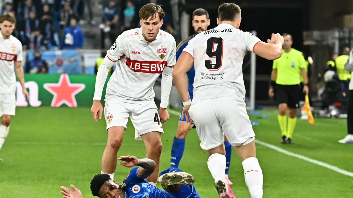 Football: UEFA Champions League - 1st round day 2: Slovan Bratislava (SVK) v VfB Stuttgart (GER): Slovan Bratislava's Panamanian defender #28 Cesar Blackman vies for the ball with Stuttgart's German defender #04 Josha Vagnoman and Stuttgart's Bosnian forward #09 Ermedin Demirovic during the UEFA Champions League - 1st round day 2 - football match SK Slovan Bratislava v VfB Stuttgart in Bratislava, Slovakia on October 14, 2026. (Photo by Joe Klamar / AFP)