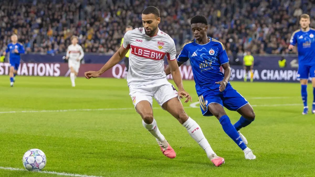 Josha Vagnoman of VfB Stuttgart and Suleiman Camara of SK Slovan Bratislava seen during UEFA Champions league League phase game between teams of SK Slovan Bratislava and VfB Stuttgart Dominika Kortvelyesiova/Ball Raw Images Bratislava Tehelne Pole stadium Slovakia Copyright: xDominikaxKortvelyesiovax DKOR6642