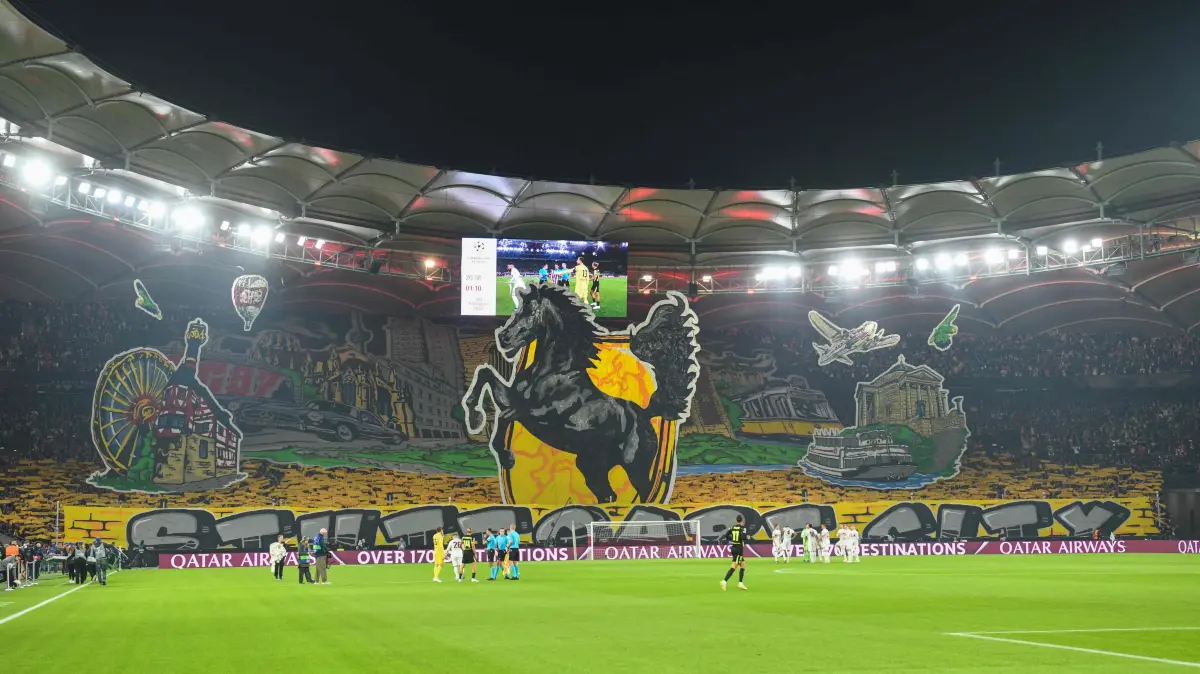 FBL-EUR-C1-STUTTGART-ATLETICO MADRID: Stuttgart fans display a giant tifo in the stands prior to the UEFA Champions League football match between VfB Stuttgart and Atletico Madrid in Stuttgart, southwestern Germany, on October 20, 2026. (Photo by THOMAS KIENZLE / AFP)